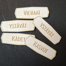 Katso kuvagalleriassa, Pyyhekyltit
